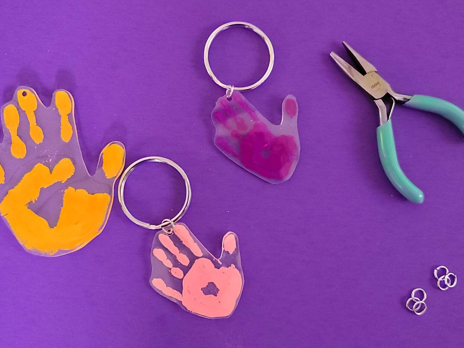 how-to-make-shrinky-dink-handprint-keychains-tengemsdiy